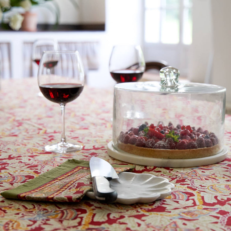 Couleur Nature - Noel Red & Green French Tablecloth elegantly displayed with a mixed-berry tart and wine, highlighting festive charm and artisanal craftsmanship.