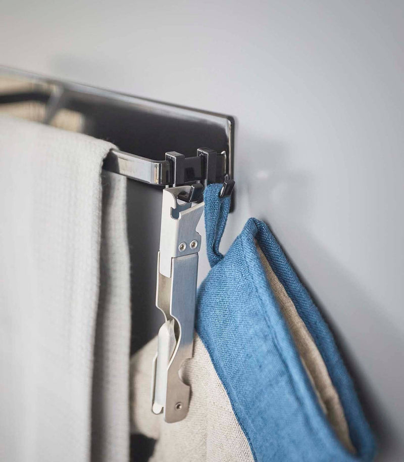 Yamazaki Home - Magnetic Kitchen Towel Hanger - Steel: White, featuring a mounted rail with clips for organizing towels and kitchen tools, enhancing workspace efficiency.