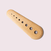 Collin Garrity - Herb Stripper: Maple, features a wooden gauge with holes for herb stripping and seed scraping, ideal for kitchen tasks. Limited-release, handmade in St. Louis.