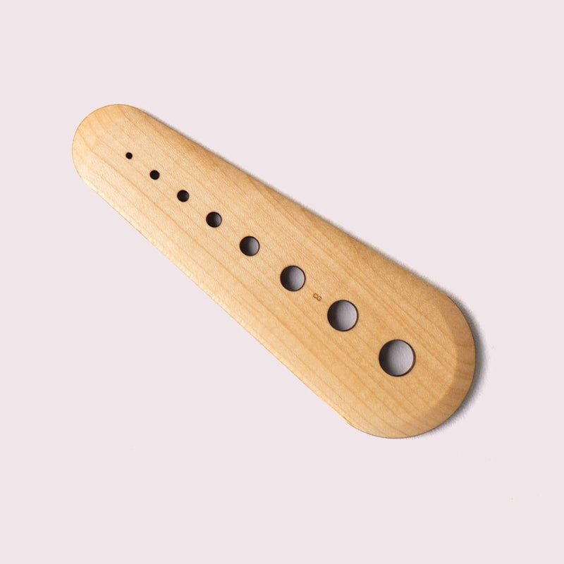 Collin Garrity - Herb Stripper: Maple, features a wooden gauge with holes for herb stripping and seed scraping, ideal for kitchen tasks. Limited-release, handmade in St. Louis.