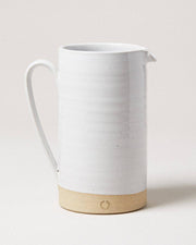 Farmhouse Pottery - Silo Pitchers: Petite, a tall ceramic pitcher with a white glazed body and natural clay base, perfect for serving drinks or displaying flowers.