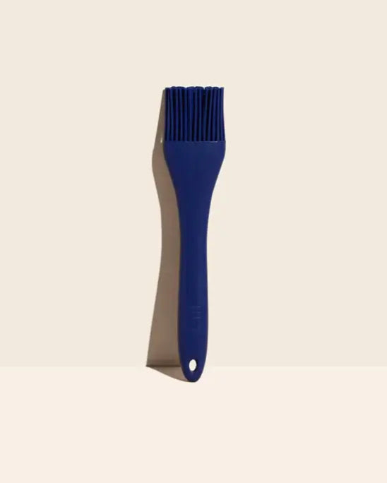 GIR Get It Right - GIR Basting Brush: Navy with dual bristles and comfortable handle for efficient liquid application, displayed on a white surface.