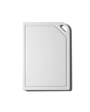 The MK Free Board™️: Cloud, a plant-based cutting board with a juice groove and handle slot, ideal for safe, non-porous chopping, available at Athens Cooks.