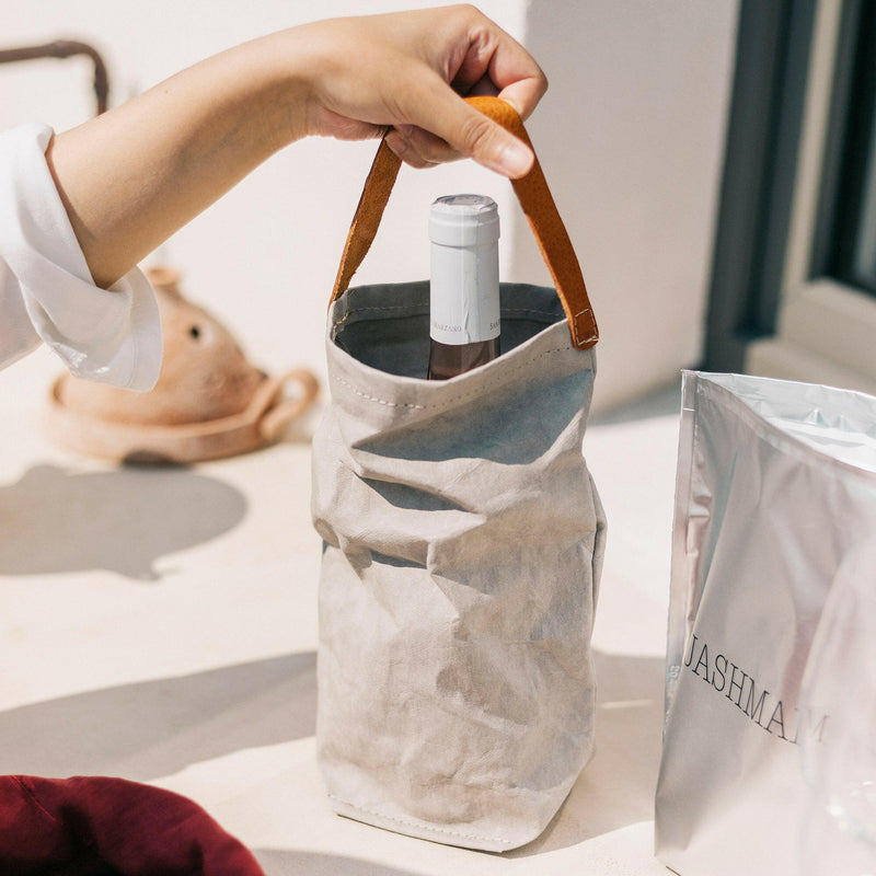 UASHMAMA Wine Bag Carrying Tote with Cooler, featuring a stylish washable paper design and leather strap, perfect for chic wine transportation.