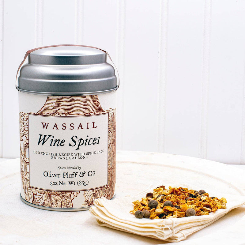 Oliver Pluff & Company - Wine Spices Wassail Kit featuring a labeled canister and a muslin spice bag, perfect for crafting traditional spiced wine or wassail.