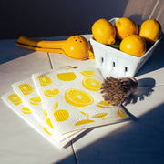 Bespoke Provisions - Lemons Swedish Dishcloth, featuring lemons in a white bowl, ideal for hygienic cleaning of glass and countertops. Biodegradable and compostable.