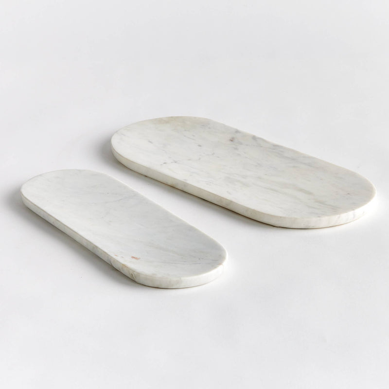 Napa Home & Garden - Amal Marble Trays, a pair of sleek oval marble trays perfect for serving cheese and fruit, ideal for elegant kitchen settings.