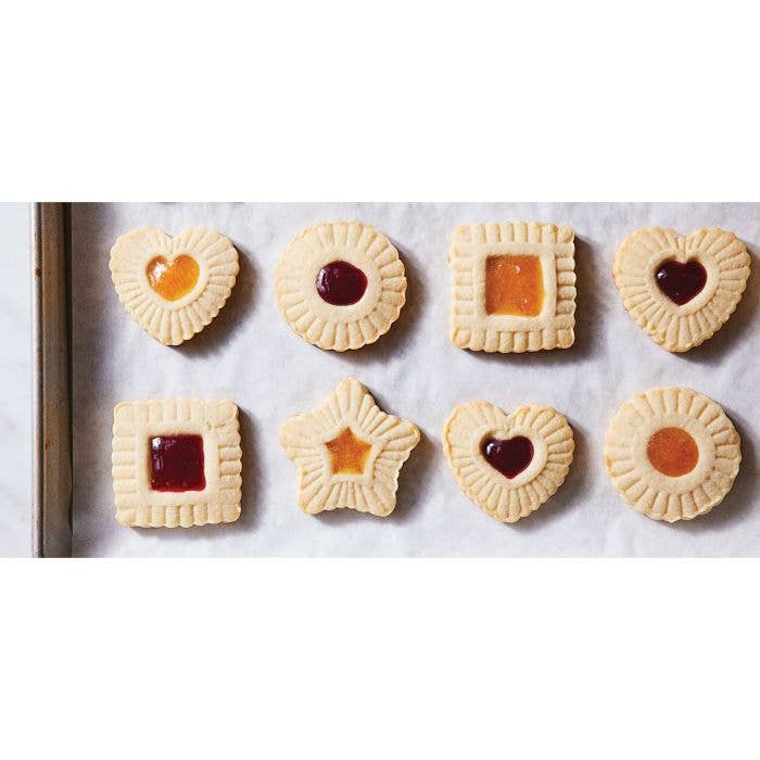 HIC - Harold Import Co. - King Arthur Thumbprint Cookie Cutters 4-Piece Set creates embossed, filled cookies with heart, star, square, and round designs on parchment paper.