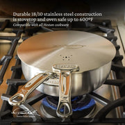 Hestan Provisions | Commercial Clad Stainless Steel Universal Lid, 8.5 Inches, on a gas burner, showcasing its durable and eco-friendly design with Thomas Keller Insignia logo.