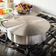 Hestan Provisions | Commercial Clad Stainless Steel Universal Lids, 8.5 Inches, on a cooktop, surrounded by prep bowls with beans and diced vegetables, exemplifying professional culinary use.