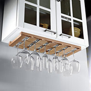 J.K. Adams Stemware Rack mounted under a kitchen cabinet, holding wine glasses upside-down in its slotted design, demonstrating efficient under-cabinet storage for up to 15 glasses.