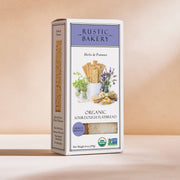 Rustic Bakery - Flatbreads - Herbs de Provence Organic Sourdough in a lavender-accented box, featuring USDA Organic and Non-GMO seals, ideal for culinary enthusiasts.