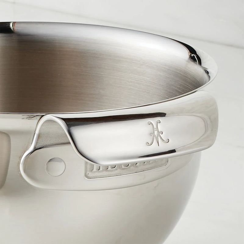 Hestan 4pc Stainless Steel Mixing Bowl Set, featuring 1.5qt, 3.0qt, 4.75qt, and 7.0qt bowls, showcased in a close-up view.