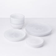 Fortessa | La Jolla White 10.5 Dinner Plate, featured in a stack of white ceramic dinnerware, emphasizing its elegant design for sophisticated dining.