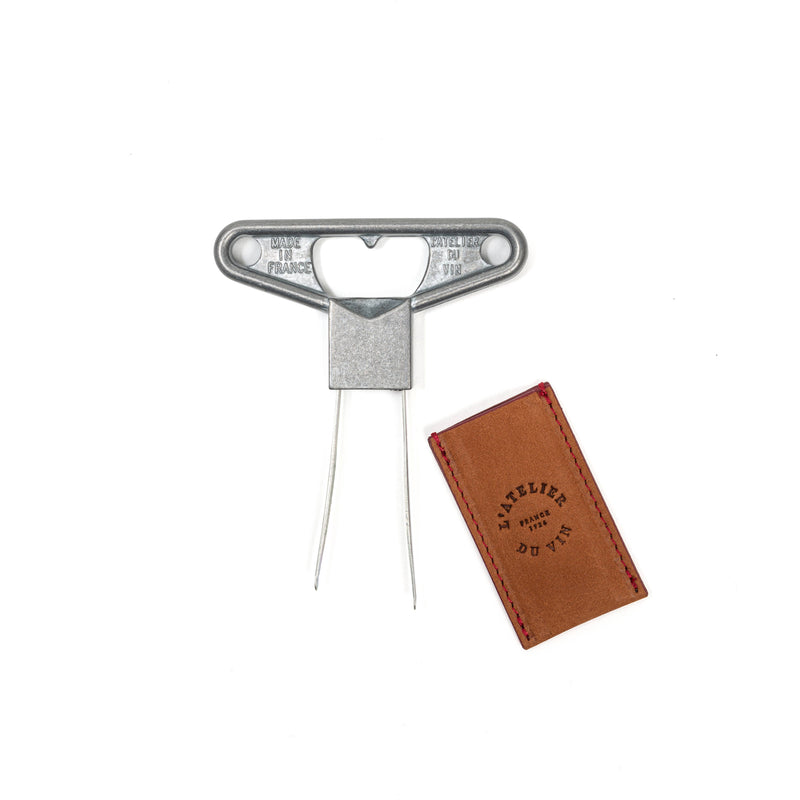 L'Atelier du Vin - USA - Twin Blade Wine Opener - BILAME CRAFT with branded leather sheath, showcasing precision and craftsmanship, ideal for sophisticated wine enthusiasts.
