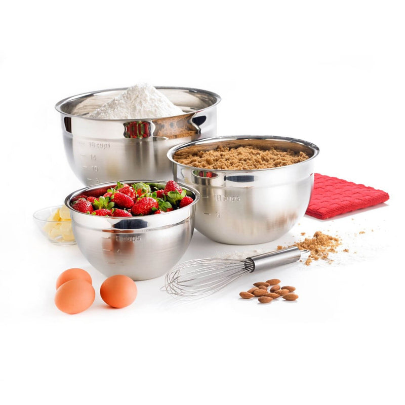 Cuisipro | Set of 3 Stainless Mixing Bowls with various ingredients, including strawberries and almonds, showcasing versatile use in culinary preparation.