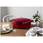 Staub | Wide Oval Dutch Oven - Graphite Grey, featuring a wide oval shape, ideal for braising and baking with self-basting lid for flavorful cooking.