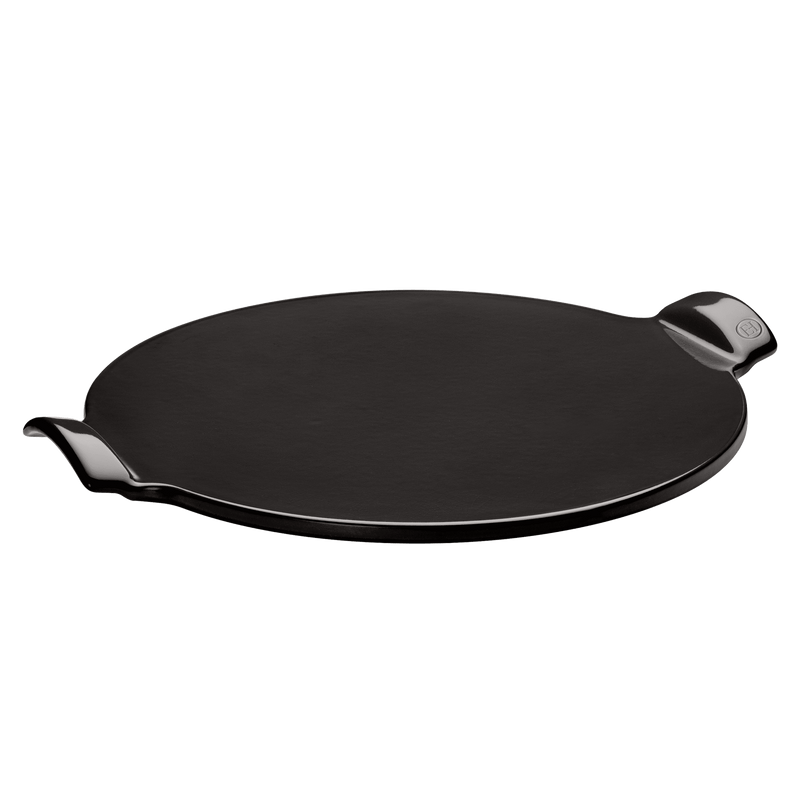 Emile Henry Smooth Pizza Stone, Charcoal, with flat circular design and small handles, perfect for home pizza baking, mimicking traditional brick oven results.