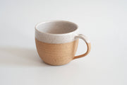 RachaelPots - 18 Oz Jumbo Mug: Nude/White; hand-thrown stoneware mug with handle and thumb rest, ideal for coffee or soup. Microwave and dishwasher safe.