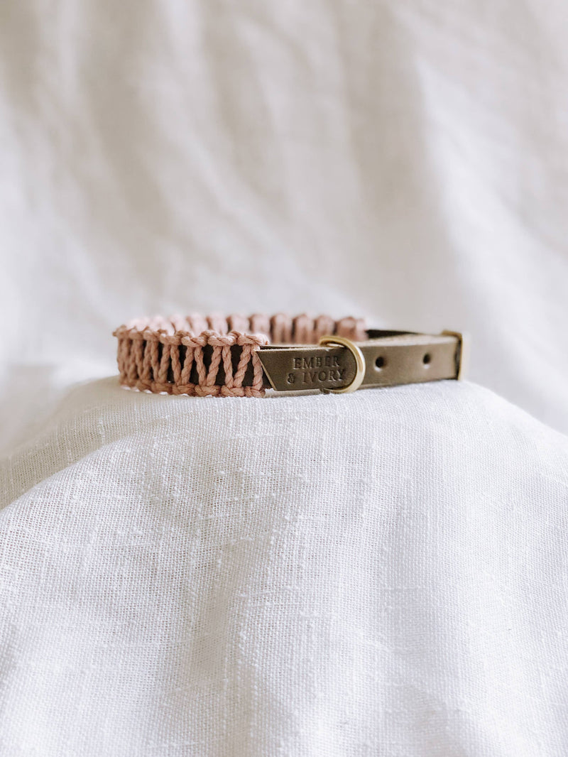 EMBER & IVORY - Olive/Blush Macrame & Leather Dog Collar: S (10 1/2 - 13 3/4), features a peach macramé cord with brass hardware on taupe leather, resting on soft fabric.