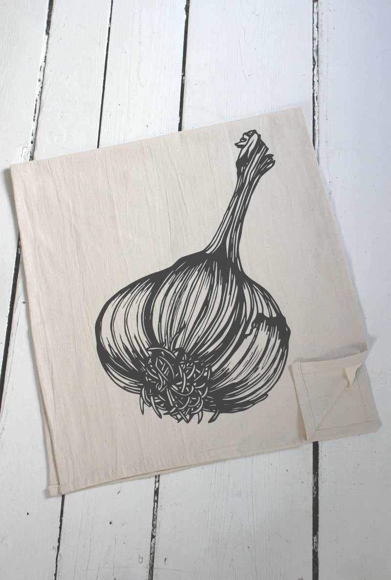 Hearth and Harrow | Organic Cotton Garlic Tea Towel features a detailed garlic bulb drawing, hand-printed on a sustainable, eco-friendly cotton fabric.