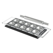 Marcato | Ravioli Tablet Pasta Makers (Red), a silver and black tool for forming and sealing ravioli, shown on a baking tray.