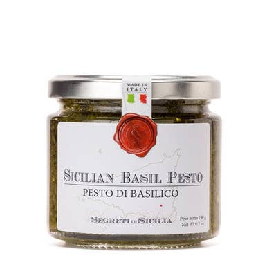 The French Farm - Frantoi Cutrera Sicilian Basil Pesto 6.7oz in a glass jar with metal lid, highlighting its Italian origin and rich, flavorful ingredients.