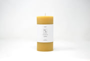 Mo&Co Home - 100% Beeswax Pillar Candle, 3x6 Inch, with a white label, showcasing a hand-poured design for eco-friendly, clean burning.