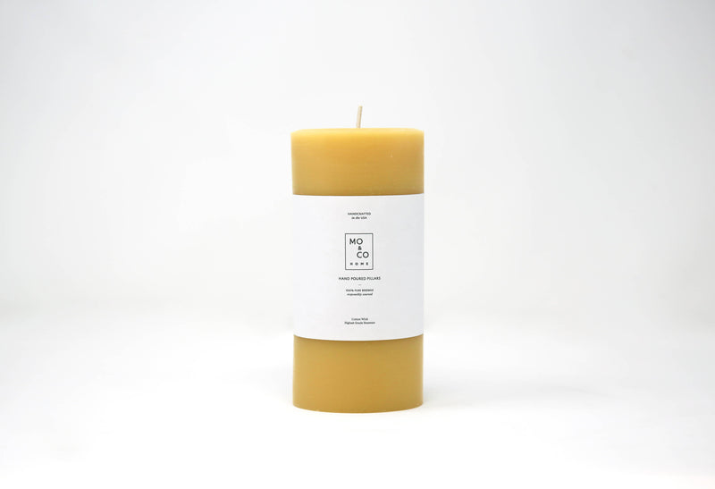 Mo&Co Home - 100% Beeswax Pillar Candle with white label, 3x4 Inch, hand-poured, eco-friendly, ideal for enriching celebrations and home decor.