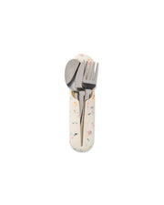 W&P - Stainless Steel Utensils Set in Silicone Carry Case: Terrazzo Charcoal, featuring a spoon, fork, and knife in a compact silicone holder for easy transport.