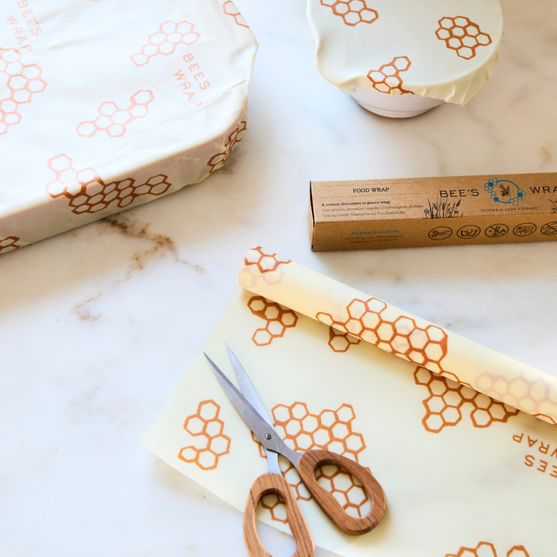 Bee's Wrap - Cut-to-Size Roll - Honeycomb with scissors, showcasing its versatile, customizable design for eco-friendly food storage solutions.
