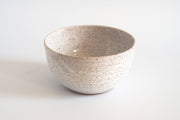 RachaelPots - Laura Bowl: Light Blue, a hand-thrown, off-white ceramic bowl with brown speckles and ribbed exterior, perfect for versatile bowl-meals.