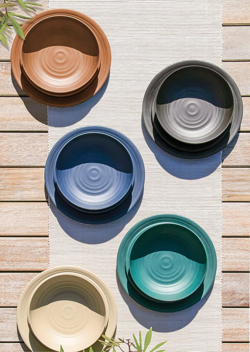 TarHong | Planta Matte Low Bowl - Black: stack of durable, plant-based ceramic lookalike bowls on table, ideal for sustainable and stylish dining.