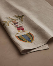 Coral & Tusk - Deck the Halls Bear Tea Towel featuring a whimsical bear embroidery in festive colors, ideal for holiday kitchen decor.