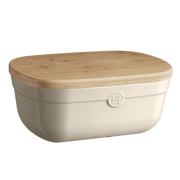 Emile Henry Bread Box with bamboo lid; ceramic storage for bread, doubles as a crumb-catching board. Ideal for kitchen counter, crafted in France.