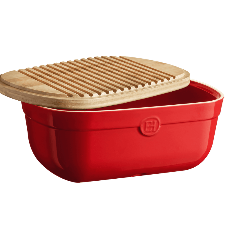 Emile Henry | Bread Box, Burgundy: Red ceramic box with a bamboo lid, doubling as a cutting board, designed to keep bread fresh with moisture-balancing properties.