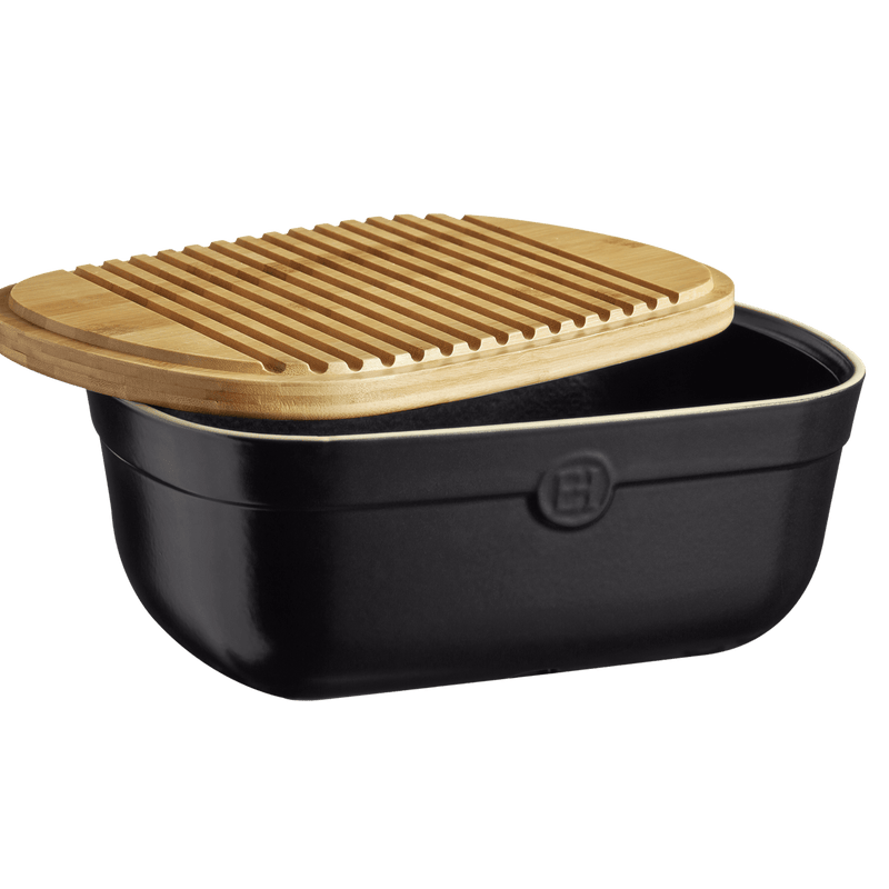 Emile Henry | Bread Box, Truffle featuring a matte-black base with a slotted bamboo lid, doubling as a crumb-collecting cutting board, perfect for countertop storage.
