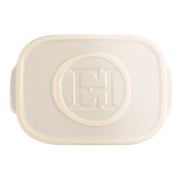 Emile Henry Cheese Box, Black: Top-down view of a cream ceramic container with embossed lid, designed for storing cheese with practical side handles.