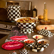 MacKenzie-Childs | Courtly Check Butter Box on a kitchen countertop, surrounded by checkered dinnerware, adding elegance and charm to the kitchen setting at Athens Cooks.