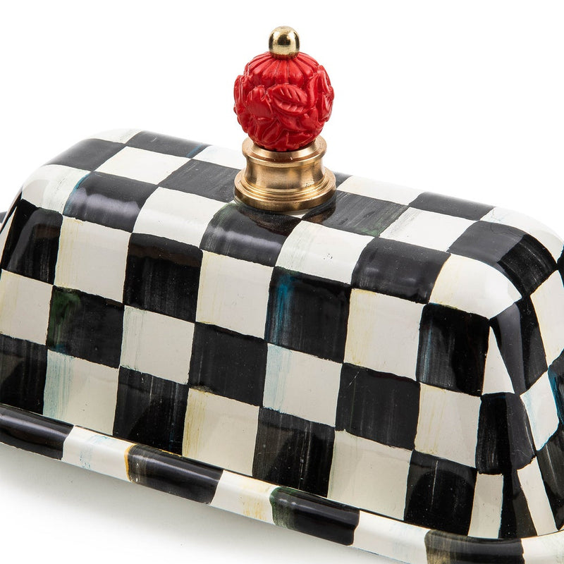 MacKenzie-Childs | Courtly Check Butter Box: Painted ceramic butter dish with a black-and-white checkerboard pattern, brass accents, and a red knob, perfect for elegant kitchen presentation.