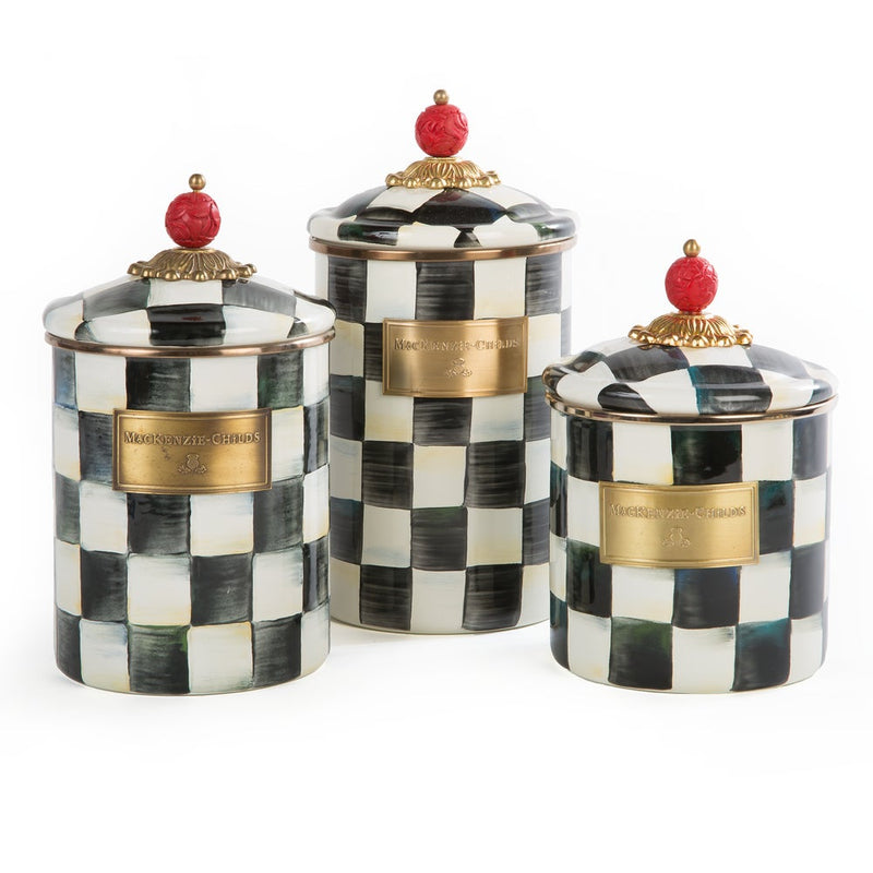 MacKenzie-Childs Courtly Check Small Canisters set, featuring hand-painted checkerboard design, brass nameplate, and sculpted red finial lids, ideal for stylish kitchen storage.
