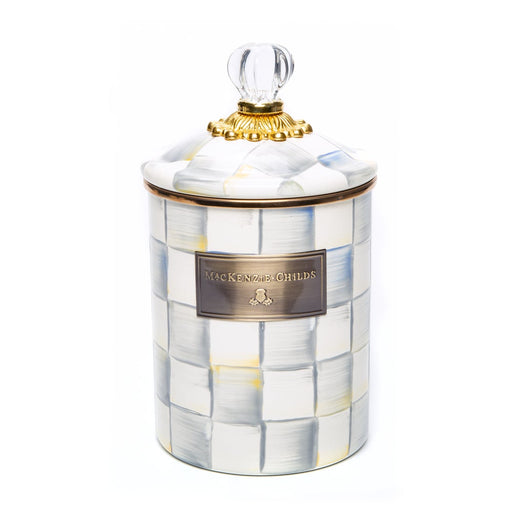 MacKenzie Childs | Sterling Check Medium Canister features a hand-painted checker pattern, a fluted lid with glass knob, and a gilded band, ideal for kitchen storage.