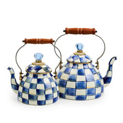 MacKenzie Childs | Royal Check Tea Kettle, 3 QT features a blue-and-white checkerboard design, wooden handle, and blue glass knob, showcasing handcrafted elegance.