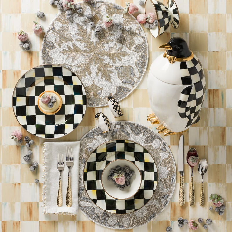 MacKenzie-Childs | Courtly Check Ice Cream Dish amidst an elegant tabletop with matching checkerboard ceramics, sugared berries, and gold-accented flatware, embodying Athens Cooks' curated sophistication.