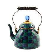 Mackenzie Childs | Juniper Check Tea Kettle, 2 QT: A decorative kettle with a green-and-navy checkerboard pattern, curved spout, dark-wood handle, and blue glass finial.