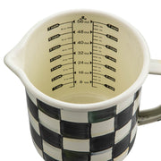 MacKenzie-Childs | Courtly Check 7 Cup Measuring Cup with black-and-white checks, spout, and handle; features internal graduated markings for accurate liquid measuring.