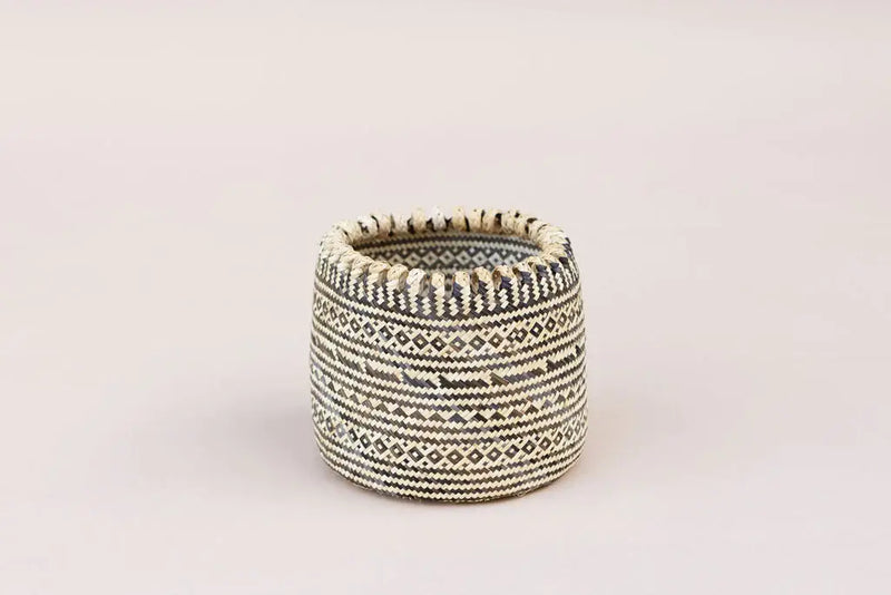 Handmade Eco Storage Basket: Beige, intricately woven by Bidayuh artisans, ideal for organizing stationery or holding houseplants, adding a unique touch to storage solutions.