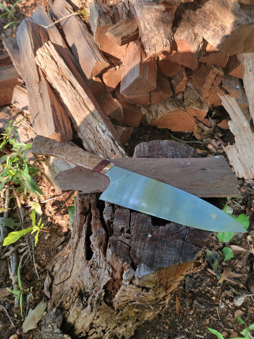 Rhymer Knives | 8 Chef Knives - African Blackwood + Rams Horn with Copper Bolster, featuring a hand-forged blade on a wooden surface. Perfect for Athens Cooks enthusiasts.