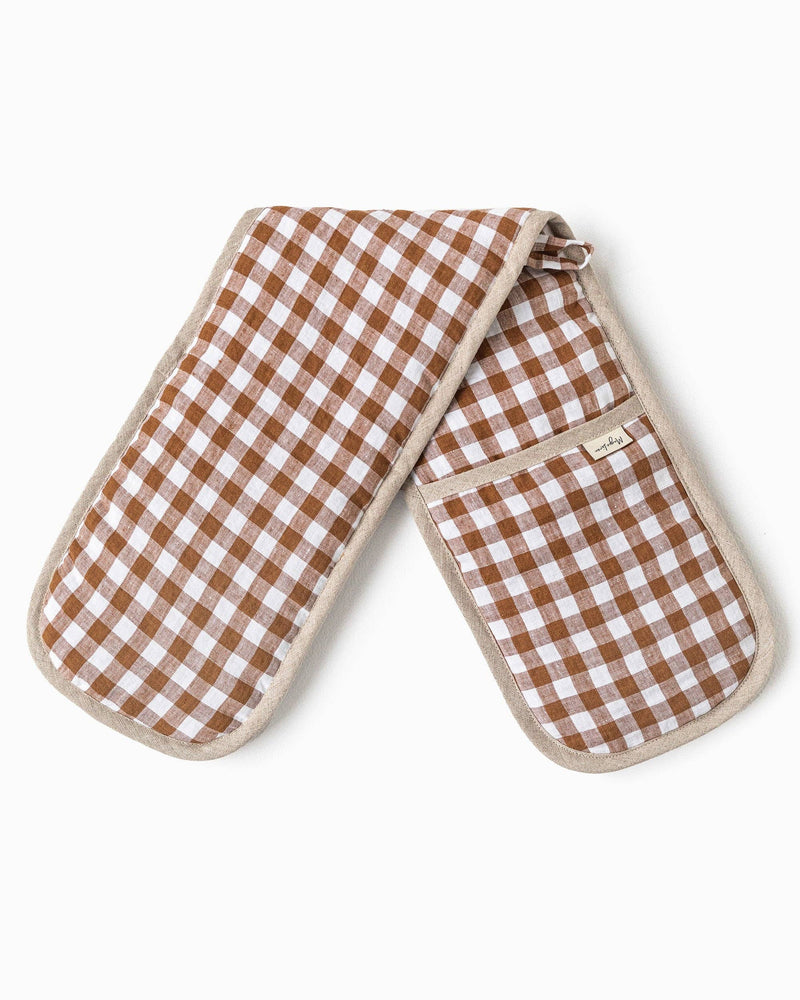 MagicLinen double oven mitts made from natural linen with a brown and white checkered pattern, designed for heat protection and sustainability.