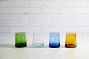 Moroccan Cone Glassware Small - Amber - Set of 6, featuring hand-blown cone-shaped glasses with visible bubbles, ideal for beverages or as decorative vases.